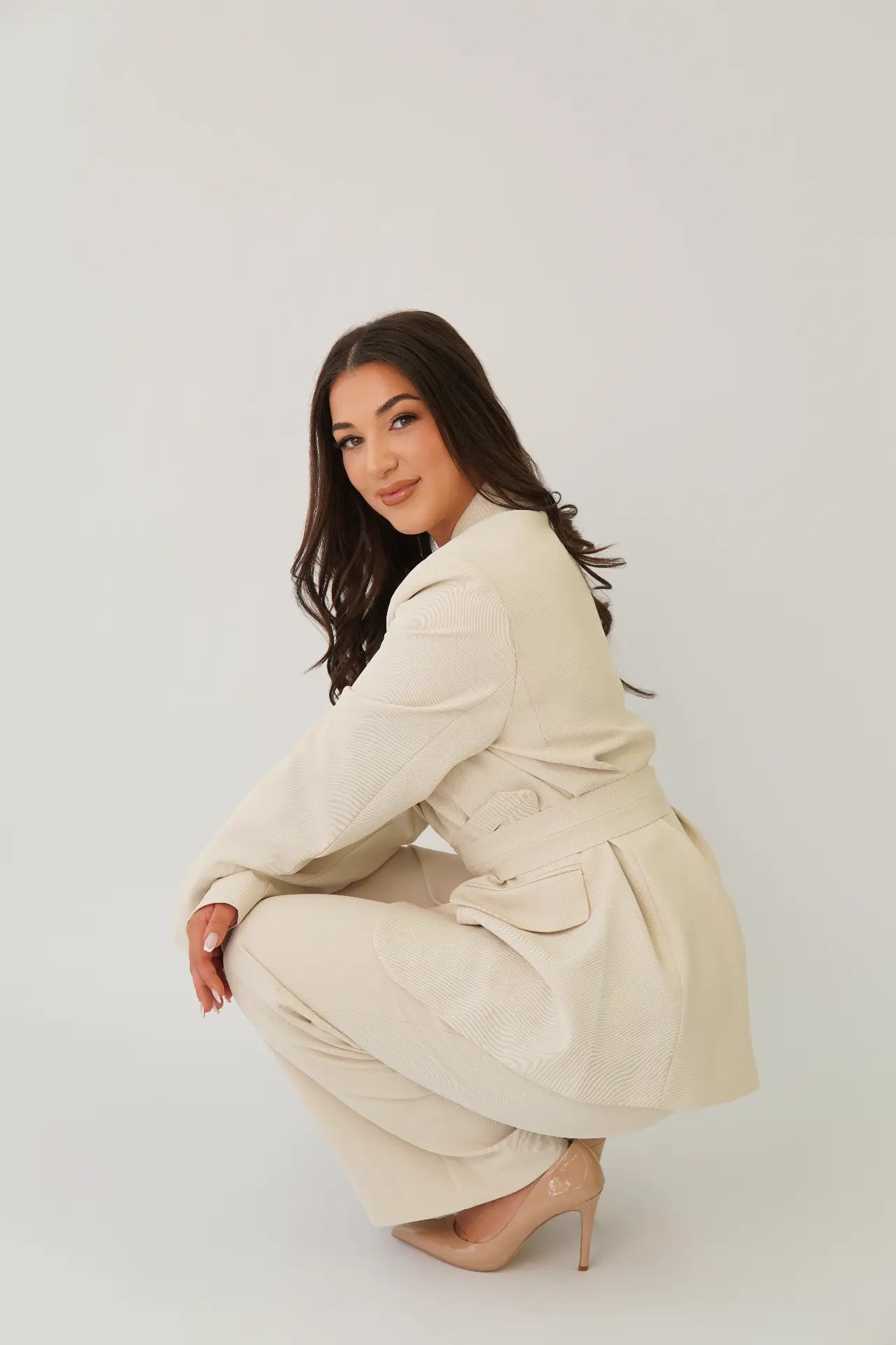 Crouched editorial founder portrait