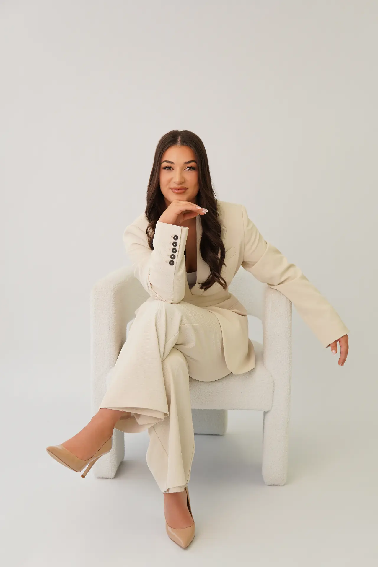 Relaxed seated founder portrait